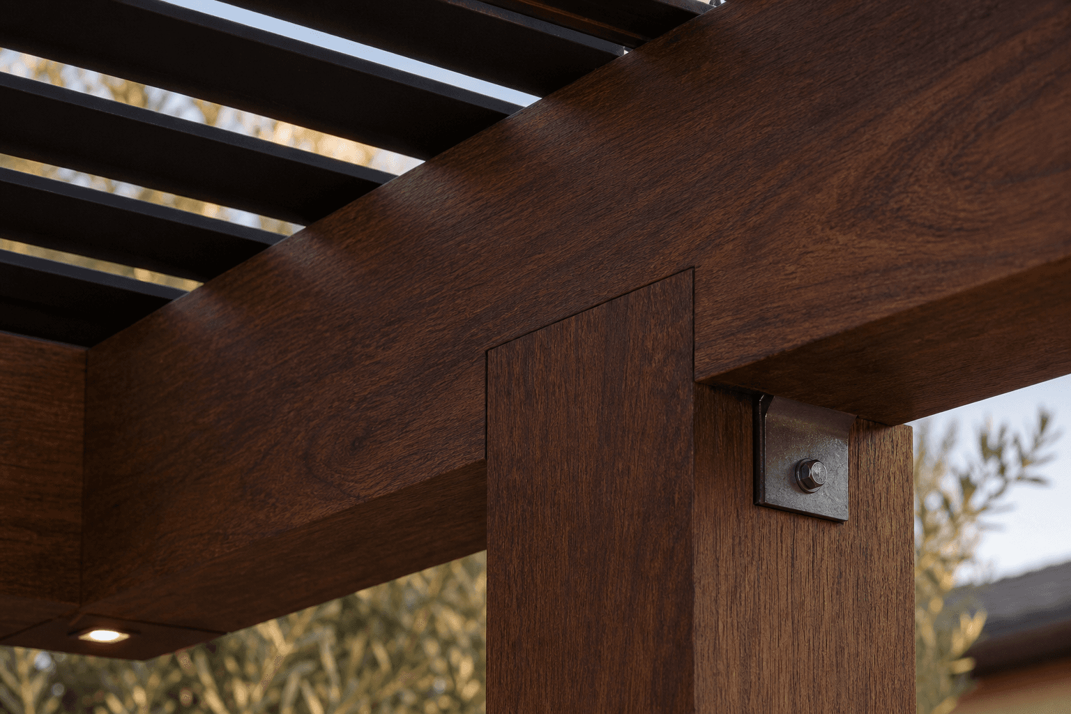 Steel-bracketed cedar joinery